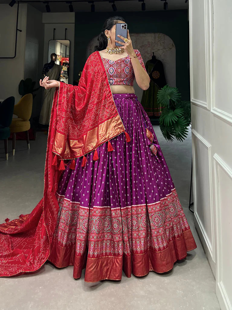 PURPLE COLOR BANDHANI AND AJRAKH PRINT WITH FOIL WORK DOLA SILK CHANIYA CHOLI